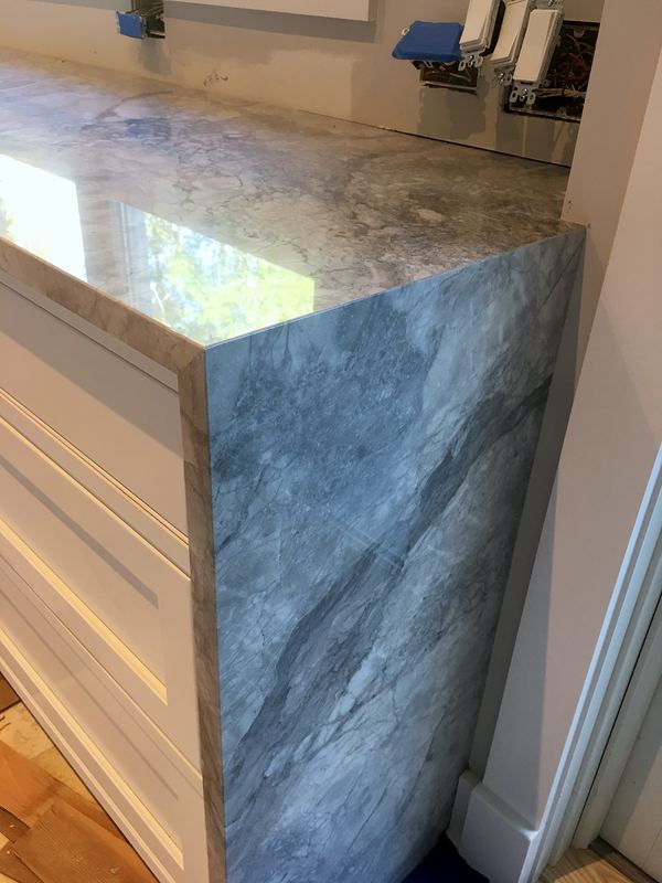 Waterfall stone countertop edge fabricated in-house
