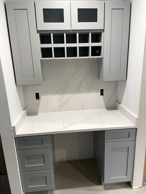 Built-in desk and wine storage