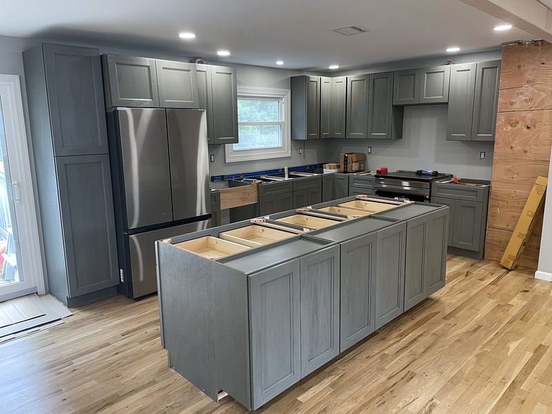 Gray kitchen island during countertop install