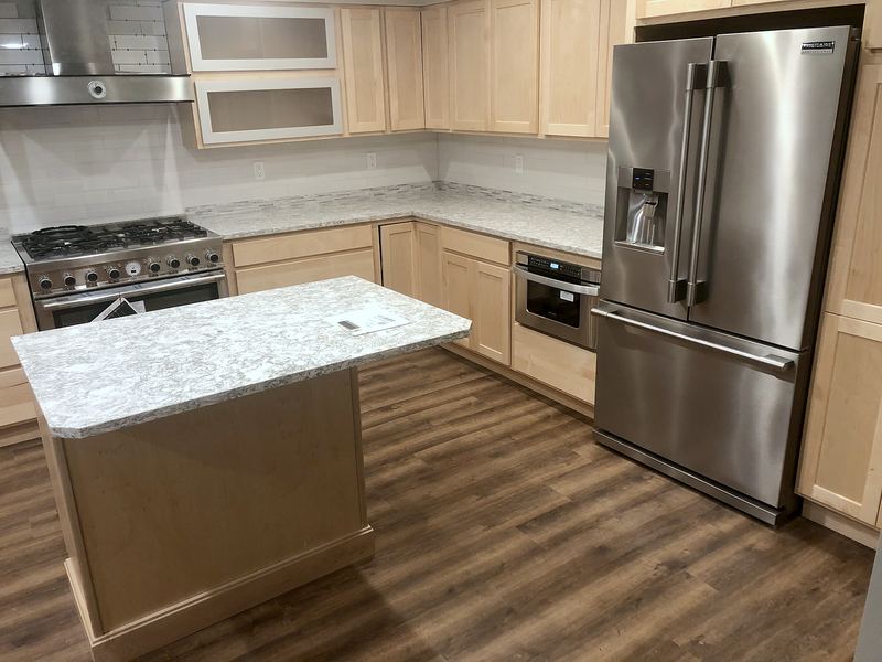 Natural maple kitchen with granite island